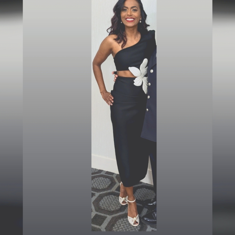 Elegant Black One-Shoulder Dress with White Floral Accent